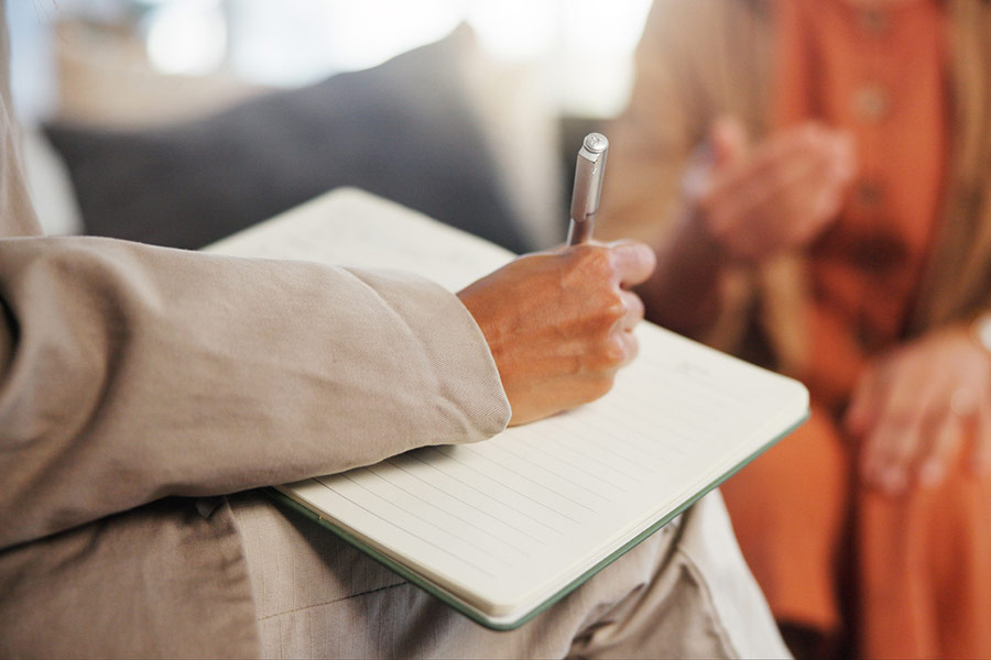 Psychiatrist offering support to patient