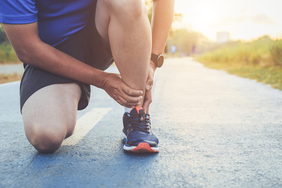 Man in need of foot pain treatment
