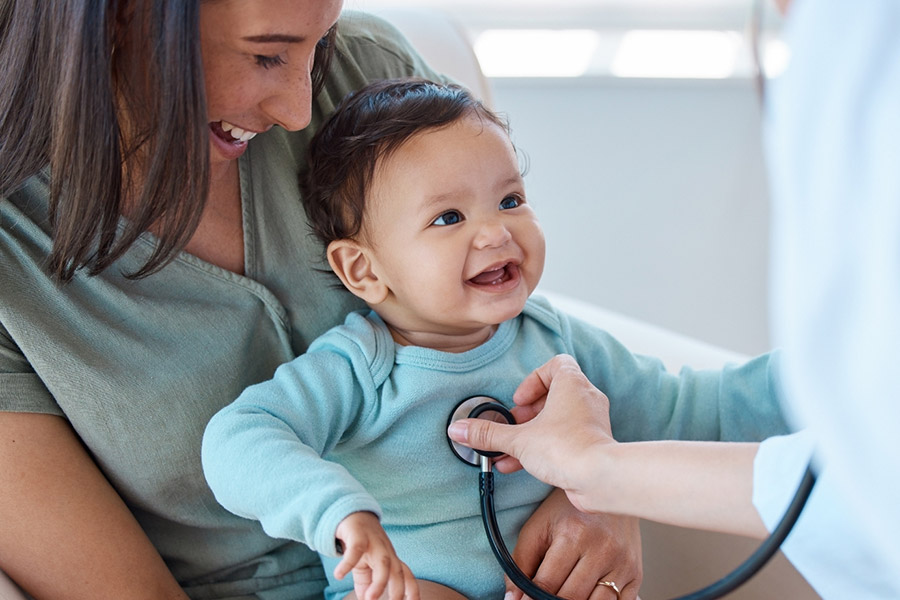 Baby being examined by a healthcare provider
